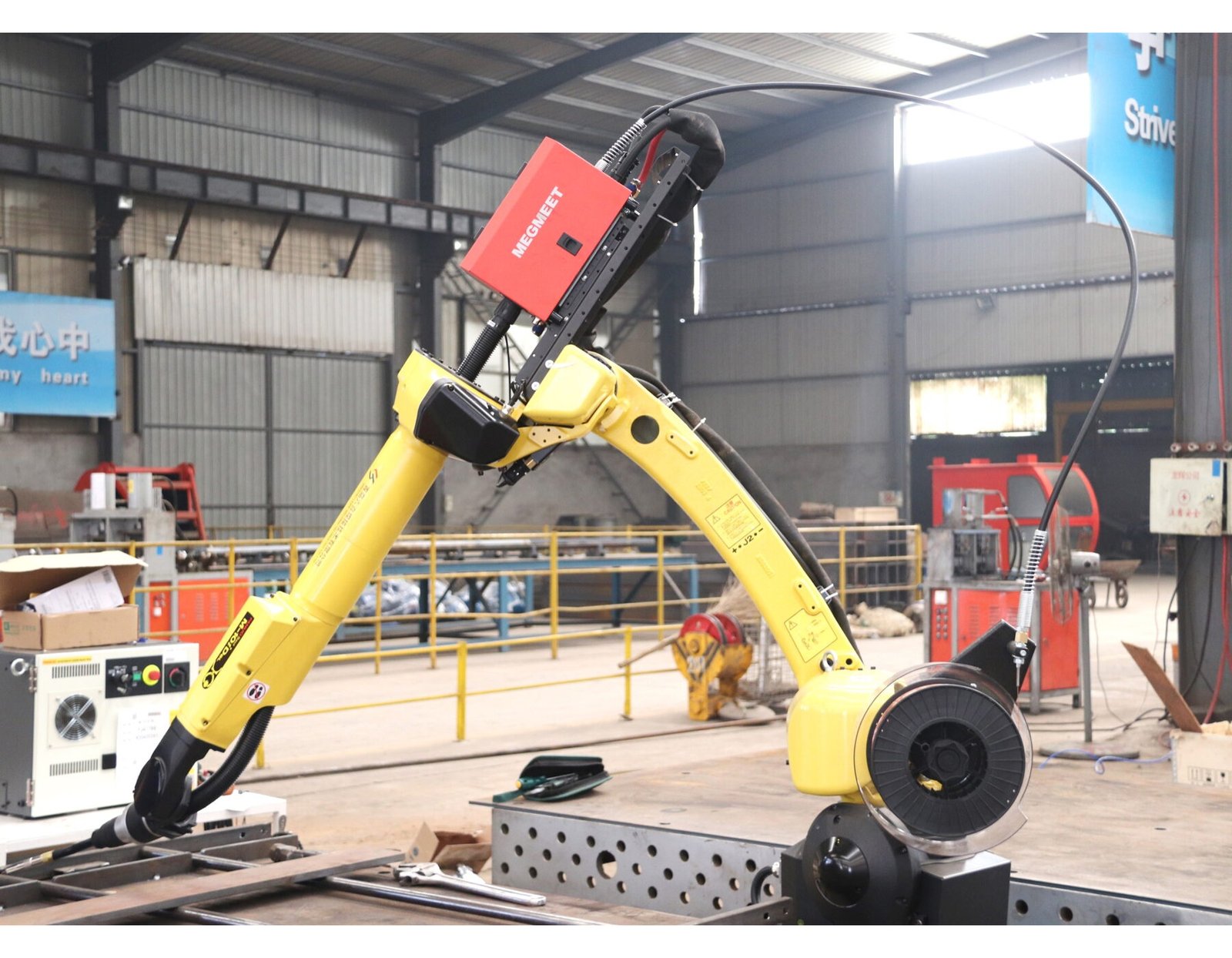Robotic welding equipment inside a supplier workshop